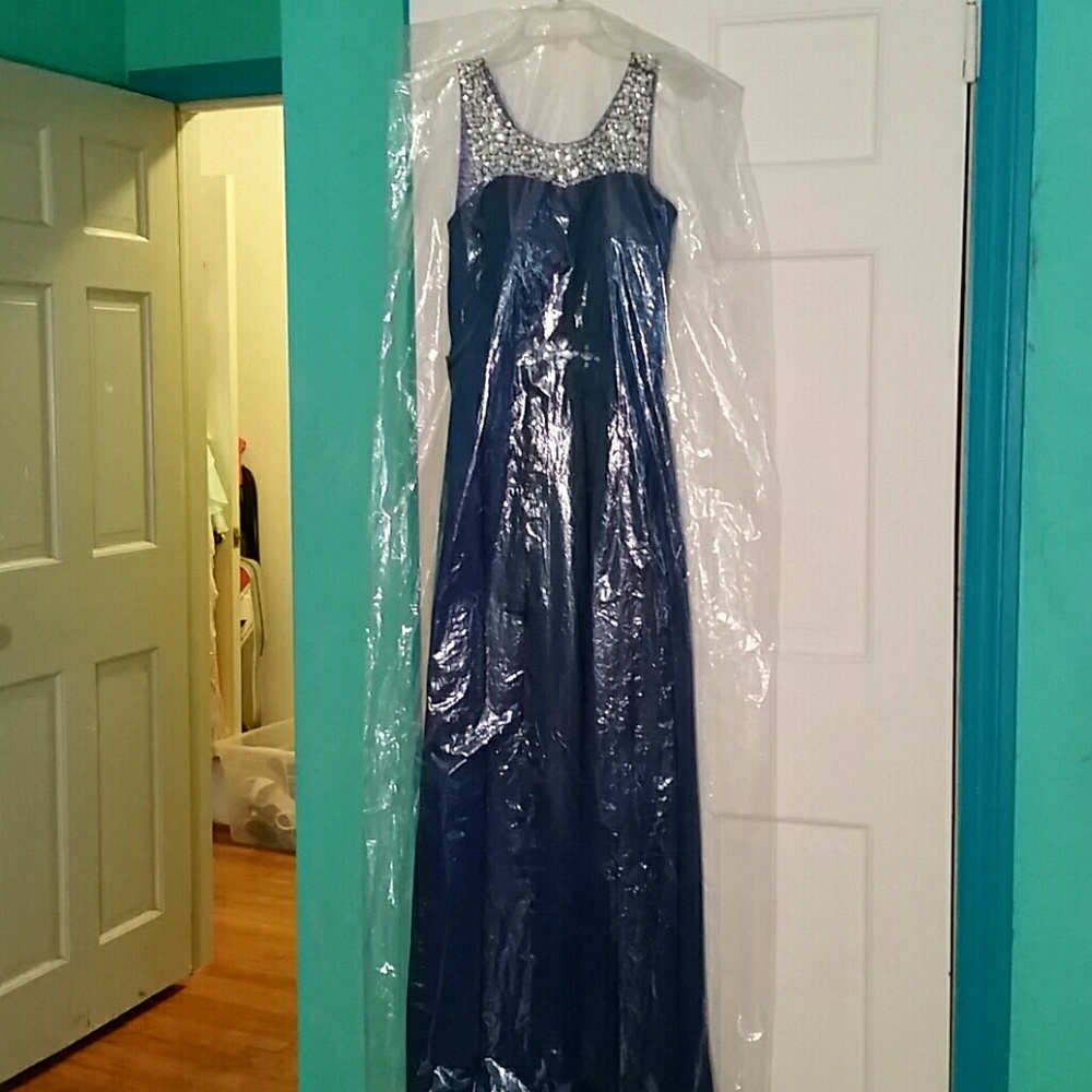 Dark blue prom dress with sparkly gems.